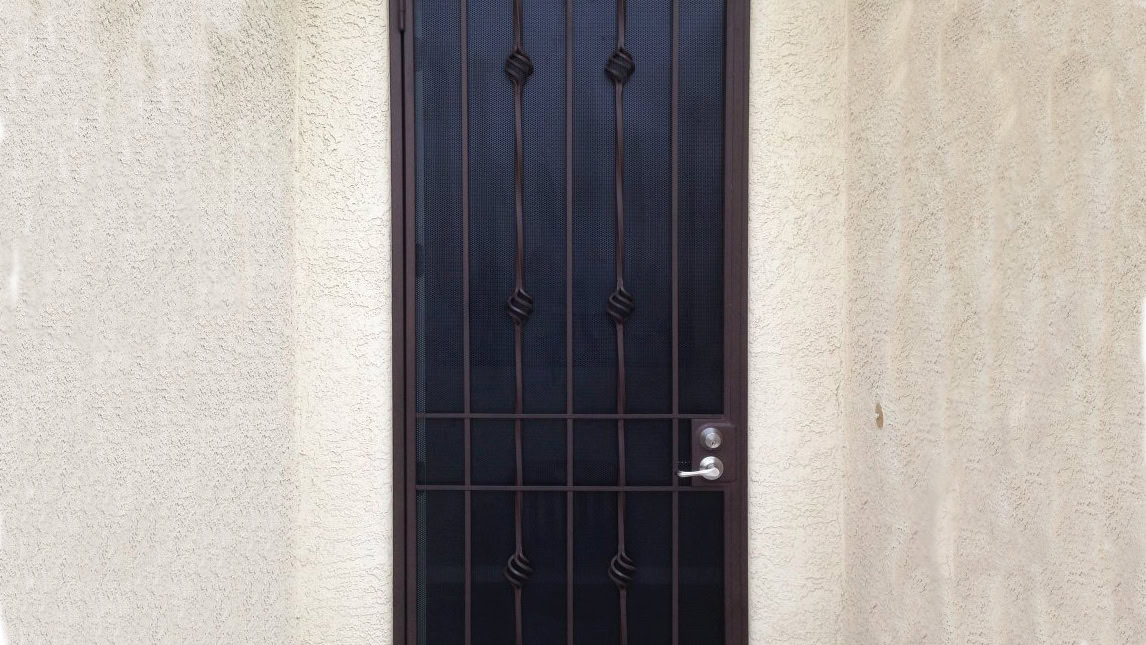 A wrought iron security door for an apartment.
