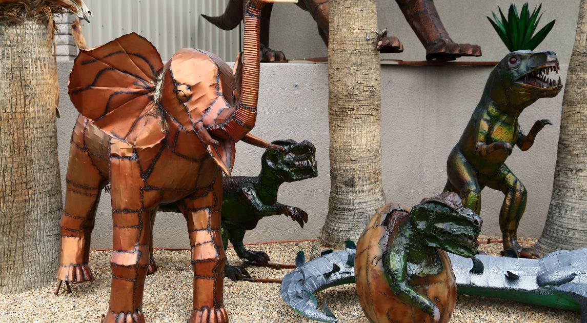 A display of wrought iron decor animals.